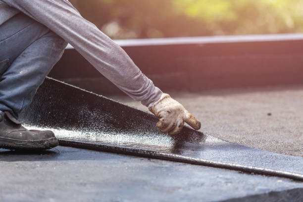 Professional Basement Waterproofing technician working in West River, MD